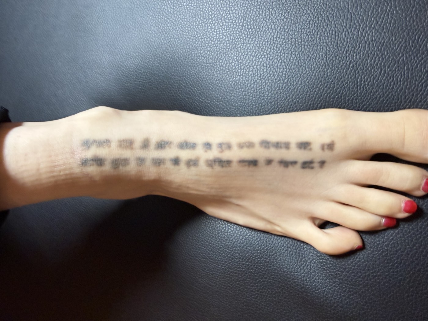 Foot script tattoo after treatment